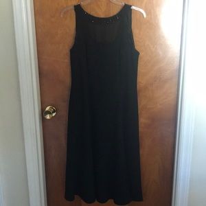 Used elegant dress.  Wore it to a formal event.